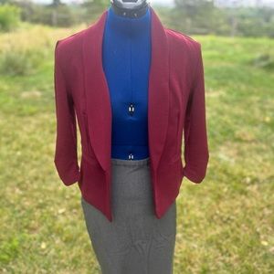 Maurice’s dark red blazer